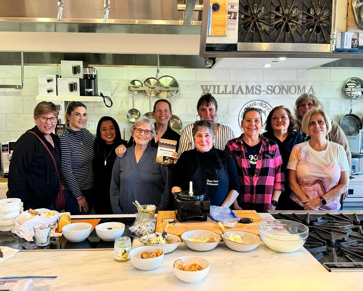 Sheana Davis and a group of students smile for a picture after a cheesemaking class at Williams Sonoma in Sonoma, California