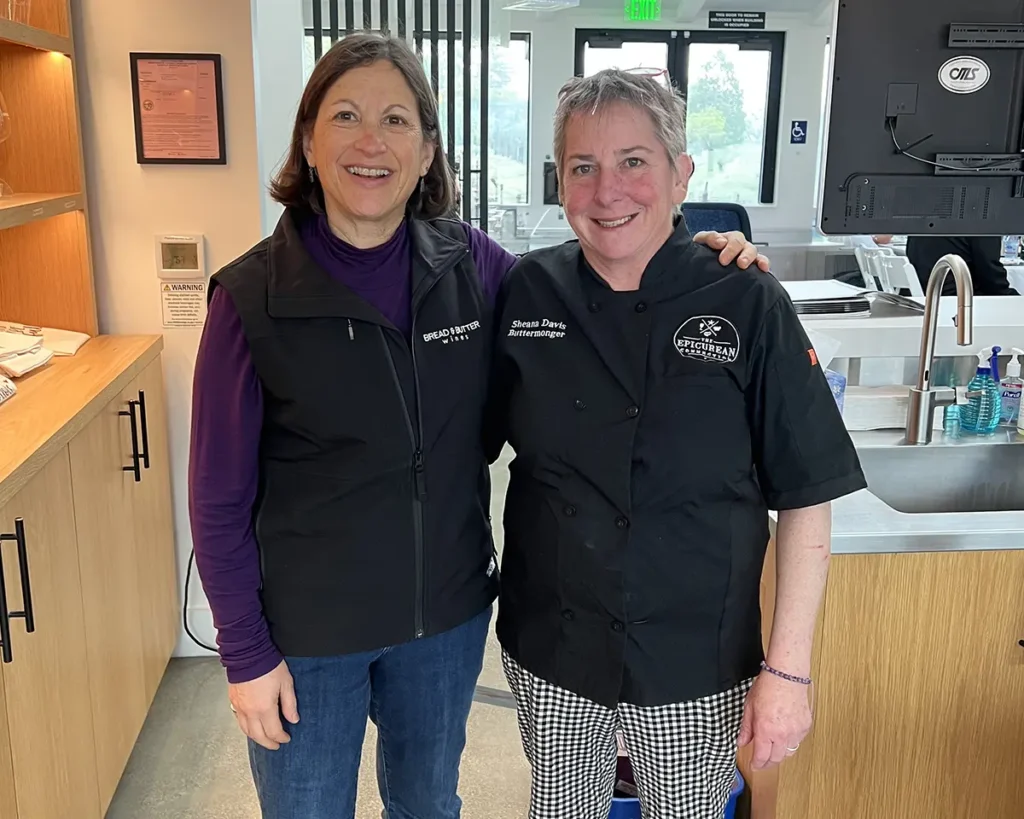 Bread & Butter Wines winemaker Linda Trotta and Epicurean Connection owner Sheana Davis pose for a picture